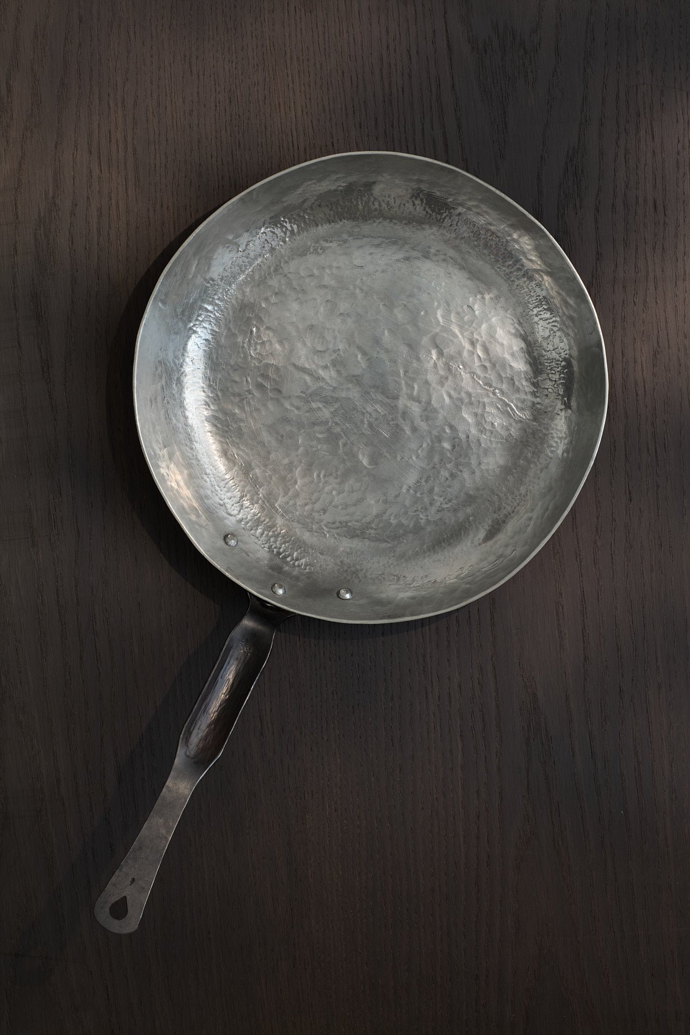 Hand raised copper frying pan top view